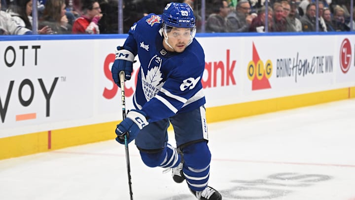Nov 8, 2023; Toronto, Ontario, CAN; Toronto Maple Leafs forward Nick Robertson (89) skates with the puck against the Ottawa Senators in the third period at Scotiabank Arena. Mandatory Credit: Dan Hamilton-Imagn Images