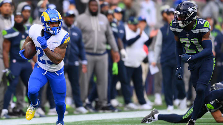 Nov 3, 2024; Seattle, Washington, USA; Los Angeles Rams running back Kyren Williams (23) carries the ball after a catch against the Seattle Seahawks during the first half at Lumen Field. Mandatory Credit: Steven Bisig-Imagn Images