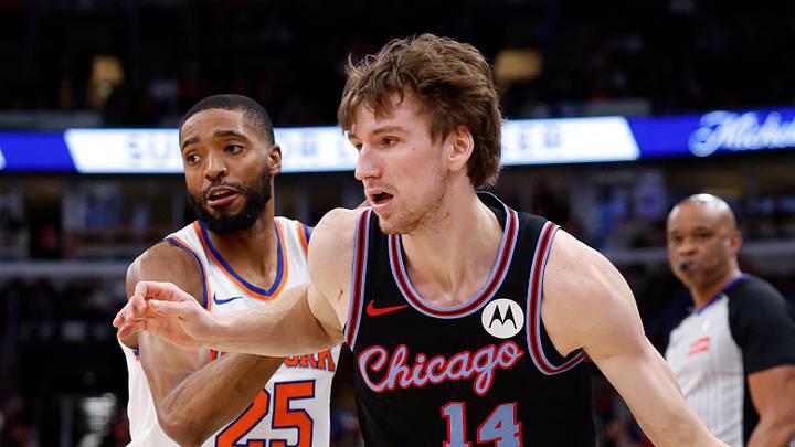 Feb 22, 2026; Chicago, Illinois, USA; Chicago Bulls forward Matas Buzelis (14) drives to the basket against New York Knicks guard Mikal Bridges (25)during the first half at United Center. Mandatory Credit: Kamil Krzaczynski-Imagn Images