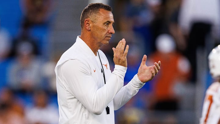 Texas Longhorns head coach Steve Sarkisian claps during warmups before the game against the Kentucky Wildcats at Kroger Field. 