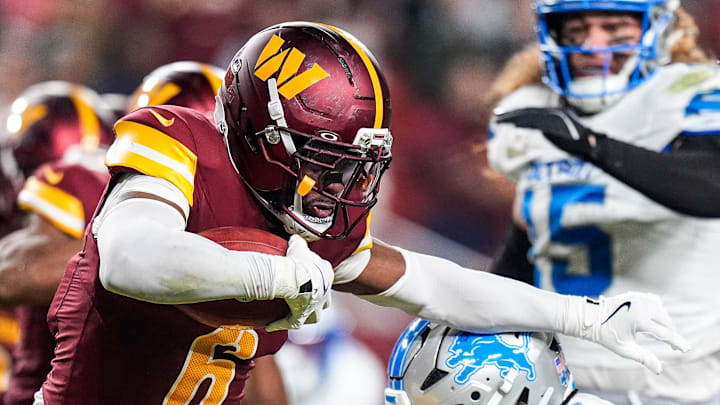 Detroit Lions cornerback Arthur Maulet (27) tackles Washington Commanders kick returner Noah Igbinoghene (6) during the second half at Northwest Stadium in Landover, Md. on Sunday, November 9, 2025.