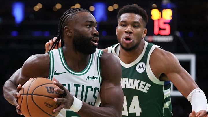 Oct 28, 2024; Boston, Massachusetts, USA; Boston Celtics forward Jaylen Brown (7) drives to the basket defended by Milwaukee Bucks forward Giannis Antetokounmpo (34) during the second half at TD Garden. Mandatory Credit: Paul Rutherford-Imagn Images