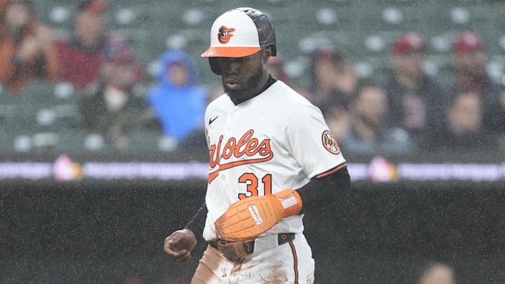 May 28, 2025; Baltimore, Maryland, USA; Baltimore Orioles center fielder Cedric Mullins (31) scores a run on Baltimore Orioles second baseman Jackson Holliday (7) (not pictured) RBI double against the St. Louis Cardinals during the second inning at Oriole Park at Camden Yards.