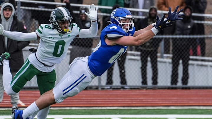 Novi Detroit Catholic Central‘s Jack Janda stretches out but fails to pull in the pass, while being covered by Cass Tech’s Lamont Wilcoxson in the fourth quarter during MHSAA semifinals at Troy Athens high school on Saturday, Nov. 23, 2024. Novi Detroit Catholic Central‘s Jack Janda stretches out but fails to pull in the pass, while being covered by Cass Tech’s Lamont Wilcoxson in the fourth quarter during MHSAA semifinals at Troy Athens high school on Saturday, Nov. 23, 2024.