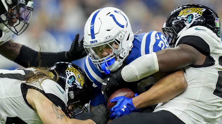 Dec 28, 2025; Indianapolis, Indiana, USA; Indianapolis Colts running back Jonathan Taylor (28) is brought down by Jacksonville Jaguars defenders during a game at Lucas Oil Stadium. Mandatory Credit: Mykal McEldowney-USA TODAY Network via Imagn Images Dec 28, 2025; Indianapolis, Indiana, USA; Indianapolis Colts running back Jonathan Taylor (28) is brought down by Jacksonville Jaguars defenders during a game at Lucas Oil Stadium. Mandatory Credit: Mykal McEldowney-USA TODAY Network via Imagn Images