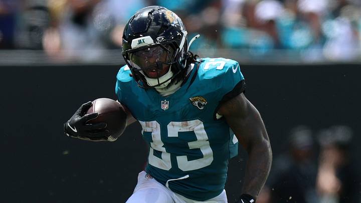 Sep 13, 2026; Jacksonville, Florida, USA;  Jacksonville Jaguars running back Bhayshul Tuten (33) runs the ball in the second quarter against the Cleveland Browns at EverBank Stadium.  Mandatory Credit: Nathan Ray Seebeck-Imagn Images