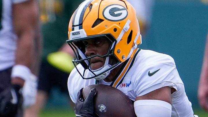 Green Bay Packers running back MarShawn Lloyd (32) runs through a drill during practice on Wednesday.