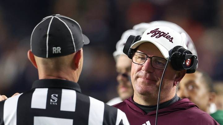 Nov 23, 2024; Auburn, Alabama, USA; Texas A&M Aggies head coach Mike Elko speaks with a game official during the second quarter against the Auburn Tigers at Jordan-Hare Stadium. Mandatory Credit: John Reed-Imagn Images Nov 23, 2024; Auburn, Alabama, USA; Texas A&M Aggies head coach Mike Elko speaks with a game official during the second quarter against the Auburn Tigers at Jordan-Hare Stadium. Mandatory Credit: John Reed-Imagn Images