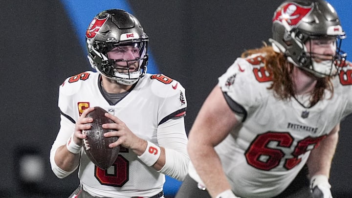 Dec 1, 2024; Charlotte, North Carolina, USA; Tampa Bay Buccaneers quarterback Baker Mayfield (6) drops back to pass during the second half against the Carolina Panthers at Bank of America Stadium. Mandatory Credit: Jim Dedmon-Imagn Images