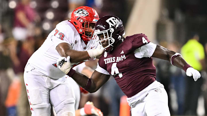 Sep 2, 2023; College Station, Texas, USA; Texas A&M Aggies defensive lineman Shemar Stewart (4) breaks past New Mexico Lobos offensive lineman Matthew Toilolo (74) during the fourth quarter at Kyle Field. Mandatory Credit: Maria Lysaker-Imagn Images