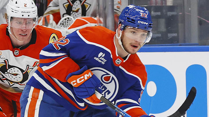 Mar 28, 2026; Edmonton, Alberta, CAN; Edmonton Oilers forward Vasily Podkolzin (92) looks to make a pass in front of Anaheim Ducks defensemen Jackson LaCombe (2) during the third period at Rogers Place. Mandatory Credit: Perry Nelson-Imagn Images