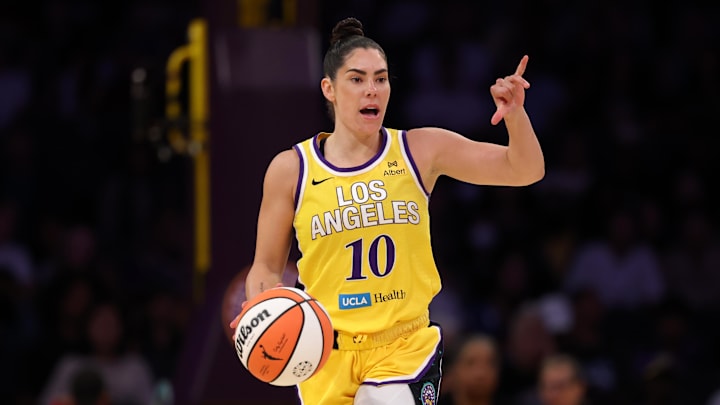 Aug 12, 2025; Los Angeles, California, USA;  Los Angeles Sparks guard Kelsey Plum (10) dribbles the ball during the first quarter against the New York Liberty at Crypto.com Arena. Mandatory Credit: Kiyoshi Mio-Imagn Images