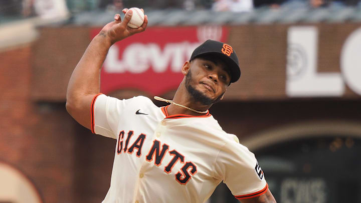Apr 24, 2025; San Francisco, California, USA; San Francisco Giants relief pitcher Camilo Doval (75) pitches the ball against the Milwaukee Brewers during the ninth inning at Oracle Park. Apr 24, 2025; San Francisco, California, USA; San Francisco Giants relief pitcher Camilo Doval (75) pitches the ball against the Milwaukee Brewers during the ninth inning at Oracle Park.