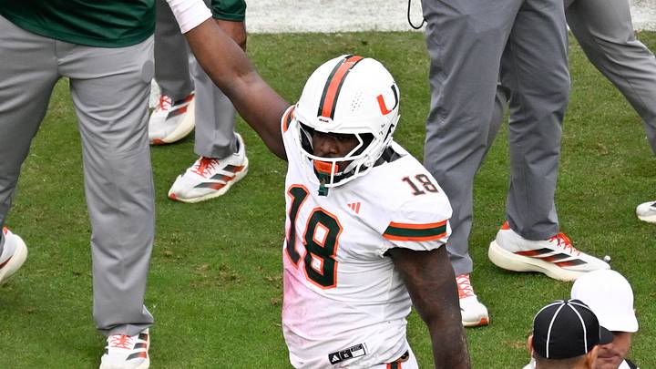 Dec 20, 2025; College Station, TX, USA; Miami Hurricanes defensive lineman Armondo Blount (18) celebrates recovering a fumble by Texas A&M Aggies quarterback Marcel Reed (not pictured) during first quarter of the first round game of the CFP National Playoff at Kyle Field. Mandatory Credit: Jerome Miron-Imagn Images Dec 20, 2025; College Station, TX, USA; Miami Hurricanes defensive lineman Armondo Blount (18) celebrates recovering a fumble by Texas A&M Aggies quarterback Marcel Reed (not pictured) during first quarter of the first round game of the CFP National Playoff at Kyle Field. Mandatory Credit: Jerome Miron-Imagn Images