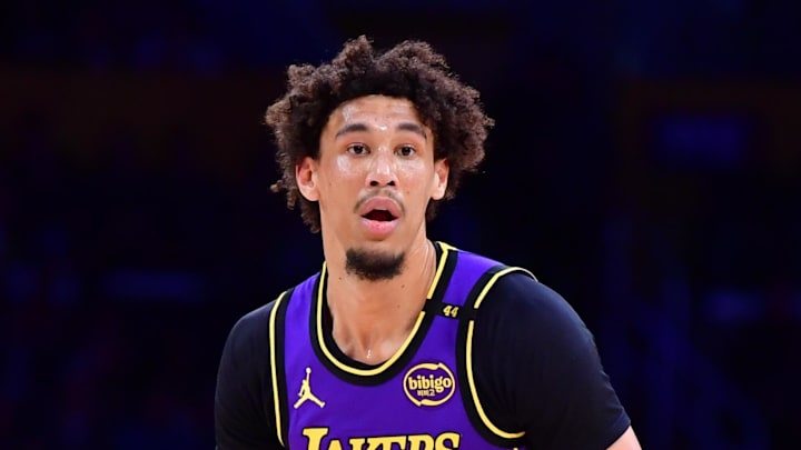 Feb 6, 2025; Los Angeles, California, USA;  Los Angeles Lakers center Jaxson Hayes (11) controls the ball against the against the Golden State Warriors during the first half at Crypto.com Arena. Mandatory Credit: Gary A. Vasquez-Imagn Images