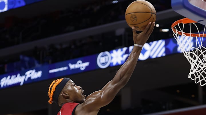 Dec 16, 2024; Detroit, Michigan, USA;  Miami Heat forward Jimmy Butler (22) shoots in the first half against the Detroit Pistons at Little Caesars Arena. Mandatory Credit: Rick Osentoski-Imagn Images
