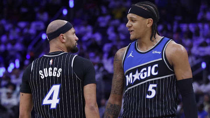 Apr 19, 2026; Detroit, Michigan, USA; Orlando Magic guard Jalen Suggs (4) and forward Paolo Banchero (5) talk during a timeout in the first half against the Detroit Pistons during a first round game of the 2026 NBA Playoffs at Little Caesars Arena. Mandatory Credit: Rick Osentoski-Imagn Images