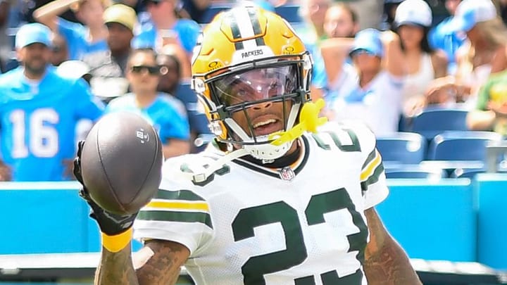 Green Bay Packers cornerback Jaire Alexander (23) scores on a pick-six thrown by Tennessee Titans quarterback Will Levis.