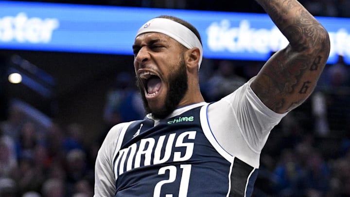 Dec 18, 2025; Dallas, Texas, USA; Dallas Mavericks forward Daniel Gafford (21) reacts after he dunks the ball against the Detroit Pistons during the second quarter at the American Airlines Center. Mandatory Credit: Jerome Miron-Imagn Images