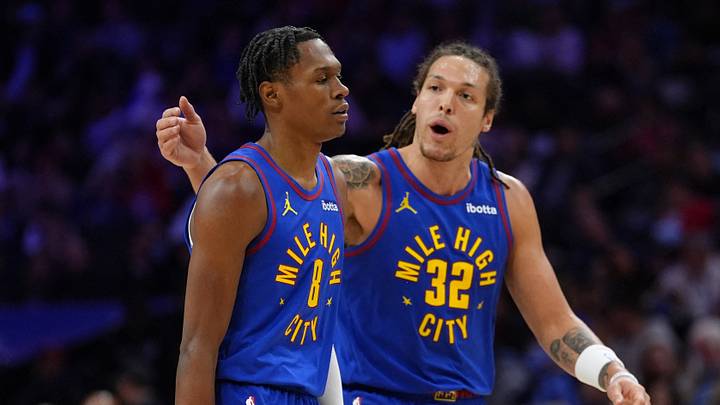 Jan 31, 2025; Philadelphia, Pennsylvania, USA; Denver Nuggets guard Peyton Watson (8) reacts with forward Aaron Gordon (32) against the Philadelphia 76ers in the second quarter at Wells Fargo Center. Jan 31, 2025; Philadelphia, Pennsylvania, USA; Denver Nuggets guard Peyton Watson (8) reacts with forward Aaron Gordon (32) against the Philadelphia 76ers in the second quarter at Wells Fargo Center.