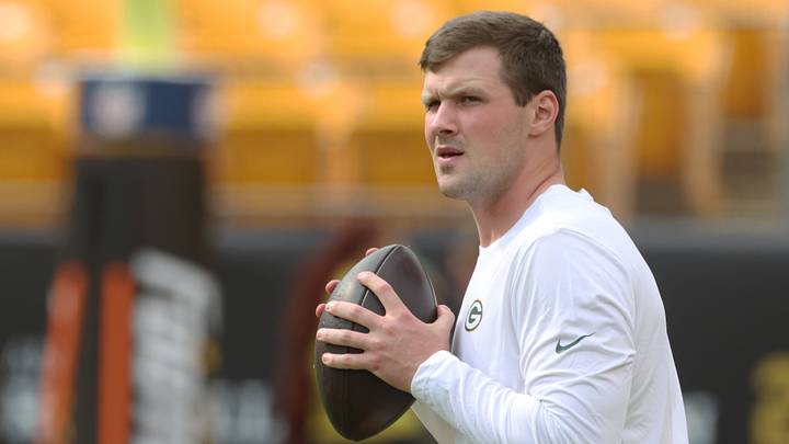 Green Bay Packers quarterback Kyle McCord (18) throws on the field before the game