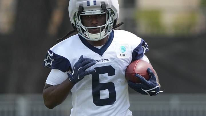 Dallas Cowboys wide receiver Camden Brown carries the ball at training camp at River Ridge Playing Fields. Dallas Cowboys wide receiver Camden Brown carries the ball at training camp at River Ridge Playing Fields.