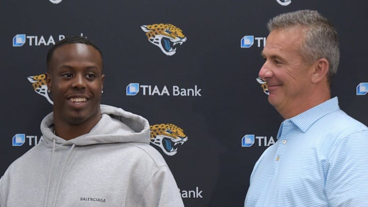 The Jacksonville Jaguars 25th pick in the first round of the NFL Draft running back Travis Etienne talks with head coach Urban Meyer as Friday afternoon's press conference ends.

Jki 043021 Trevorlawrencea 8