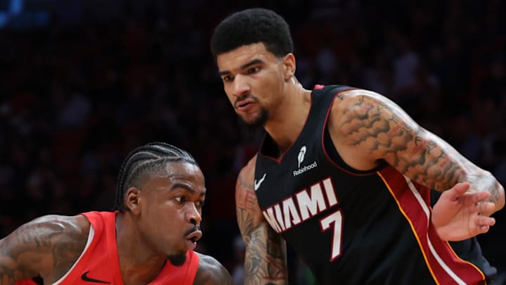 Toronto Raptors guard Jamal Shead drives to the basket against Miami Heat center Kel'El Ware.