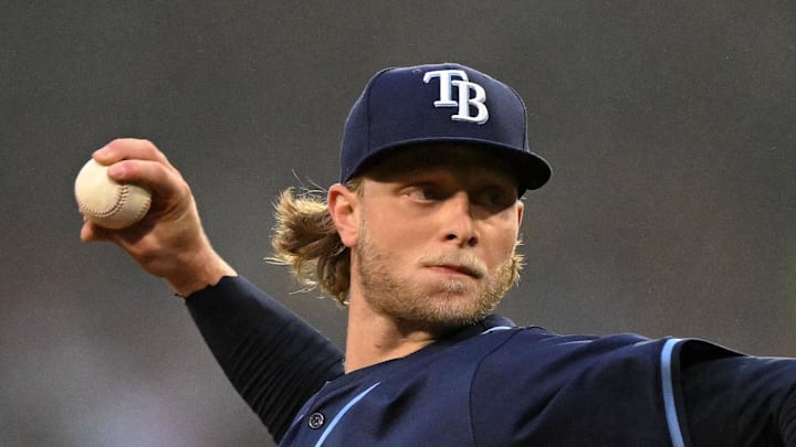 Tampa Bay Rays starting pitcher Shane Baz (11) pitches against the Boston Red Sox during the first inning at Fenway Park. 