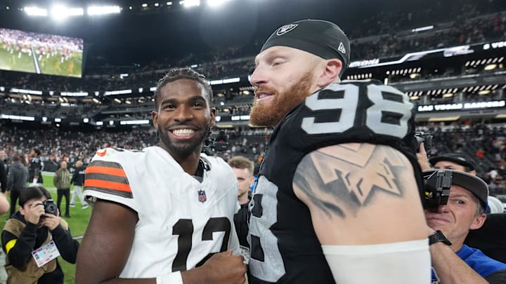 Nov 23, 2025; Paradise, Nevada, USA; Las Vegas Raiders defensive end Maxx Crosby (98) and Cleveland Browns quarterback Shedeur Sanders (12) embrace after the game at Allegiant Stadium. Mandatory Credit: Kirby Lee-Imagn Images