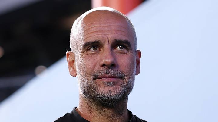 Former Manchester City manager Pep Guardiola watches play Former Manchester City manager Pep Guardiola watches play