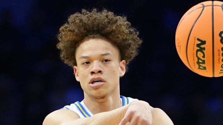 Mar 20, 2026; Philadelphia, PA, USA; UCLA Bruins guard Trent Perry (0) makes a pass against the UCF Knights in the first half during a first round game of the men's 2026 NCAA Tournament at Xfinity Mobile Arena. Mandatory Credit: Kyle Ross-Imagn Images Mar 20, 2026; Philadelphia, PA, USA; UCLA Bruins guard Trent Perry (0) makes a pass against the UCF Knights in the first half during a first round game of the men's 2026 NCAA Tournament at Xfinity Mobile Arena. Mandatory Credit: Kyle Ross-Imagn Images