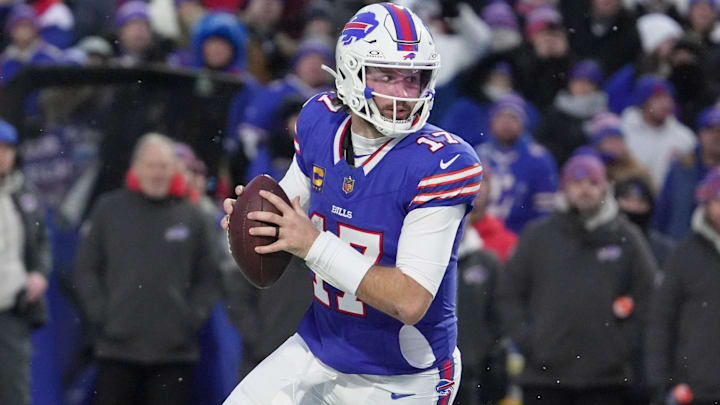 Buffalo Bills quarterback Josh Allen runs with the ball, looking to throw against the Cincinnati Bengals. Buffalo Bills quarterback Josh Allen runs with the ball, looking to throw against the Cincinnati Bengals.