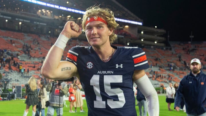 Auburn Tigers quarterback Hank Brown walks off the field after throwing four touchdowns against New Mexico.