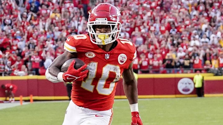Oct 22, 2023; Kansas City, Missouri, USA; Kansas City Chiefs running back Isiah Pacheco (10) scores a touchdown against the Los Angeles Chargers during the second half at GEHA Field at Arrowhead Stadium. Mandatory Credit: Denny Medley-Imagn Images