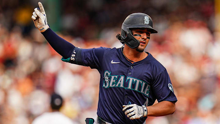 Jul 31, 2024; Boston, Massachusetts, USA; Seattle Mariners third baseman Josh Rojas (4) rounds the bases after hitting a home run against the Boston Red Sox in the fifth inning at Fenway Park