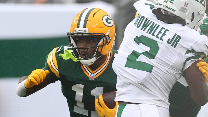 Green Bay Packers wide receiver Jayden Reed (11) carries the ball during the first quarter against the New York Jets. Green Bay Packers wide receiver Jayden Reed (11) carries the ball during the first quarter against the New York Jets.