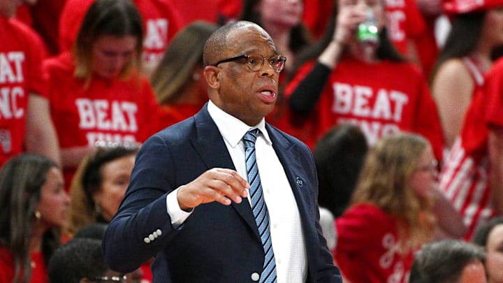 Feb 17, 2026; Raleigh, North Carolina, USA;  North Carolina Tar Heels head coach Hubert Davis reacts during the first half against the NC State Wolfpack at Lenovo Center. Mandatory Credit: Zachary Taft-Imagn Images