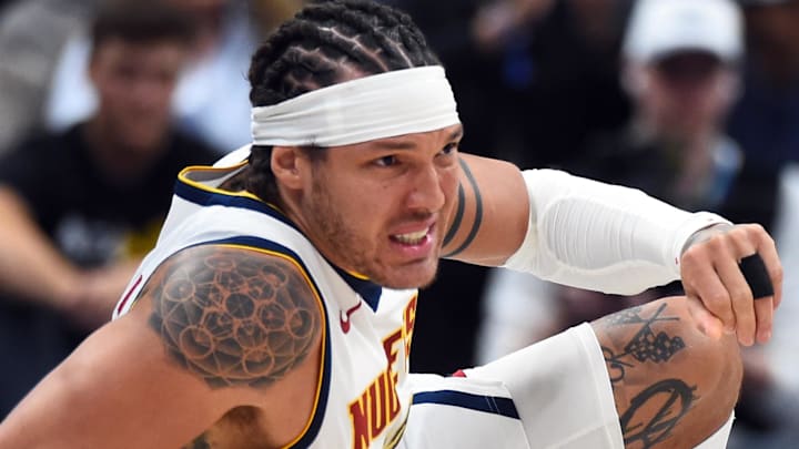 Apr 18, 2026; Denver, Colorado, USA; Denver Nuggets forward Aaron Gordon (32) on the floor after a play during the second half against the Minnesota Timberwolves in game one of the first round of the 2026 NBA Playoffs at Ball Arena. Mandatory Credit: Christopher Hanewinckel-Imagn Images