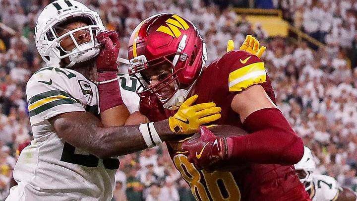Washington Commanders tight end Zach Ertz (86) stiff-arms Green Bay Packers safety Xavier McKinney to score last season. Washington Commanders tight end Zach Ertz (86) stiff-arms Green Bay Packers safety Xavier McKinney to score last season.