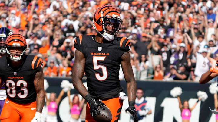 Cincinnati Bengals wide receiver Tee Higgins (5) makes a touchdown over the Baltimore Ravens in the 3rd quarter Sunday October 6, 2024 at Payor Stadium. The Bengals lost 41-38 in overtime.