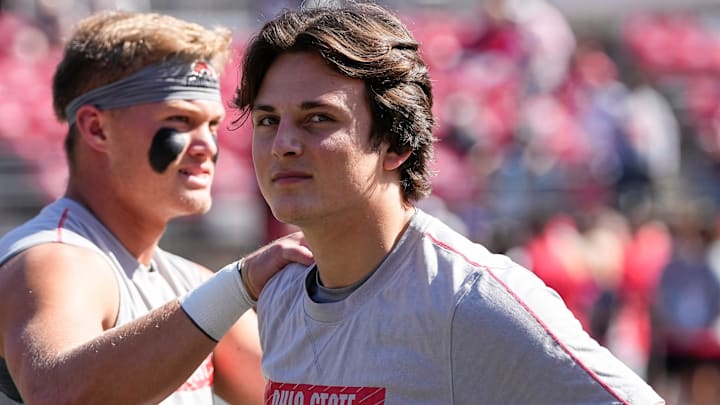 Oct 5, 2024; Columbus, OH, USA; Ohio State Buckeyes quarterback Julian Sayin and quarterback Lincoln Kienholz warm up prior to the NCAA football game against the Iowa Hawkeyes at Ohio Stadium.