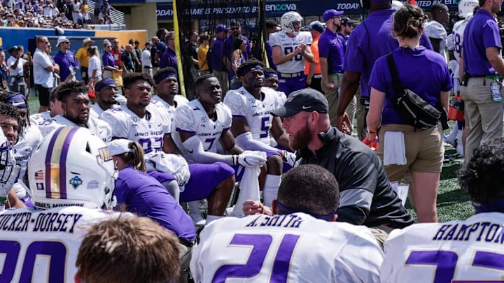 Defensive coordinator Corey Hetherman at JMU talking to his defense during the game against West Virginia. Defensive coordinator Corey Hetherman at JMU talking to his defense during the game against West Virginia.