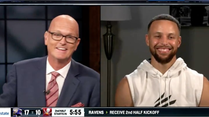 Scott Van Pelt and Stephen Curry share a laugh about the Panthers.