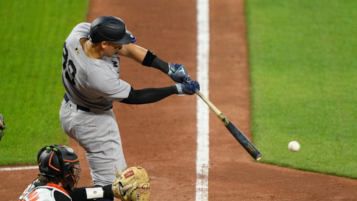 Apr 30, 2025; Baltimore, Maryland, USA; New York Yankees outfielder Aaron Judge (99) hits a single during the fifth inning against the Baltimore Orioles at Oriole Park at Camden Yards. Apr 30, 2025; Baltimore, Maryland, USA; New York Yankees outfielder Aaron Judge (99) hits a single during the fifth inning against the Baltimore Orioles at Oriole Park at Camden Yards.