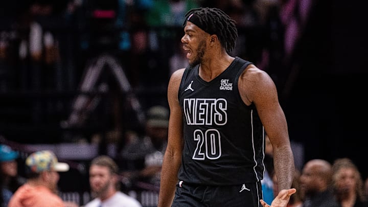 Mar 8, 2025; Charlotte, North Carolina, USA; Brooklyn Nets center Day'Ron Sharpe (20) argues for a foul during the third quarter against the Charlotte Hornets at Spectrum Center. Mandatory Credit: Scott Kinser-Imagn Images