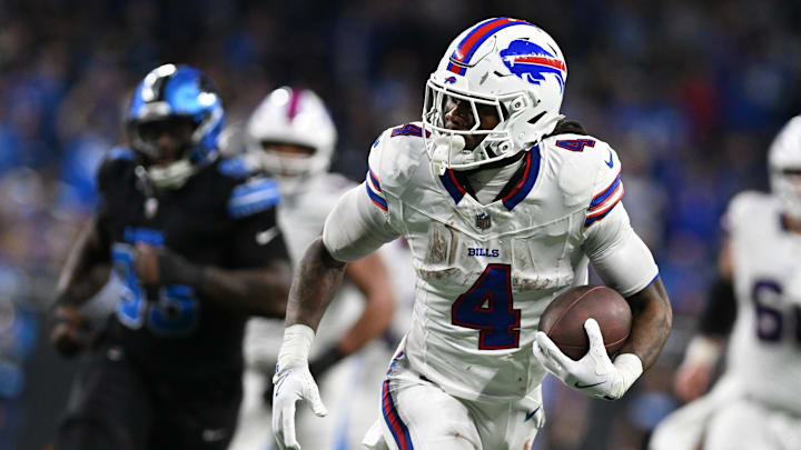 Dec 15, 2024; Detroit, Michigan, USA; Buffalo Bills running back James Cook (4) runs for a touchdown against the Detroit Lions in the third quarter at Ford Field. Mandatory Credit: Lon Horwedel-Imagn Images