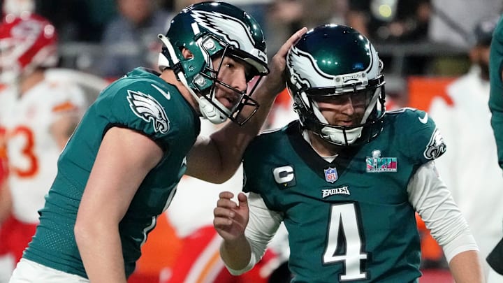 Feb 12, 2023; Glendale, Arizona, US; Philadelphia Eagles punter Arryn Siposs (8) congratulates place kicker Jake Elliott (4) on his field goal against the Kansas City Chiefs during the third quarter of Super Bowl LVII at State Farm Stadium.
