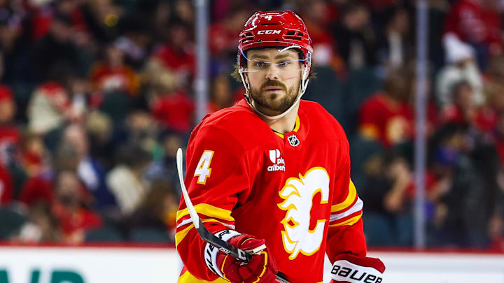 Jan 3, 2026; Calgary, Alberta, CAN; Calgary Flames defenseman Rasmus Andersson (4) against the Nashville Predators during the second period at Scotiabank Saddledome. Mandatory Credit: Sergei Belski-Imagn Images