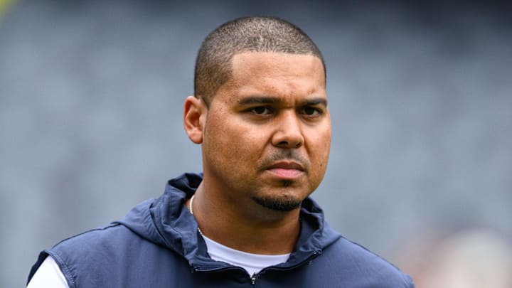 Chicago Bears general manager Ryan Poles looks on before a game.